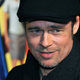 Image for article titled And Now, 10 Years of Brad Pitt’s Newsboy Cap